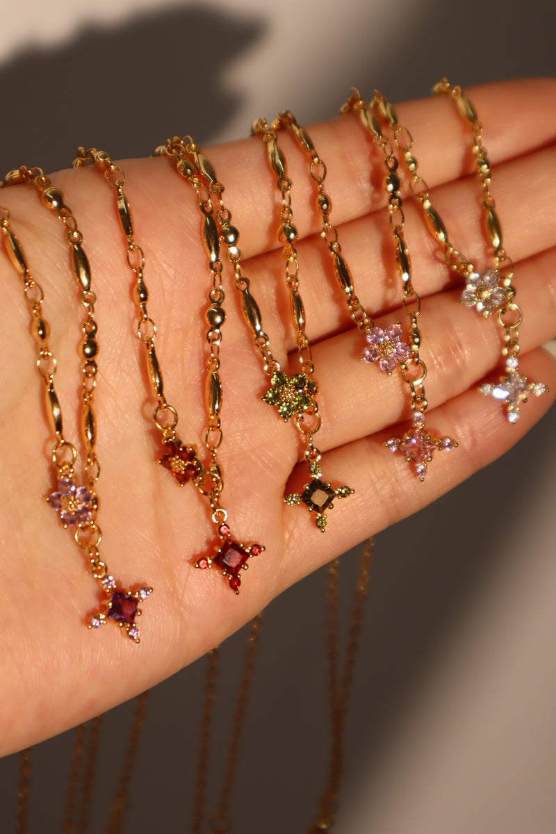 18K gold-plated cross necklace set with pink zirconia gemstones