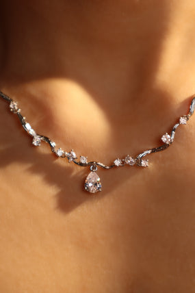 Platinum Plated Diamond Spiral Drop Necklace