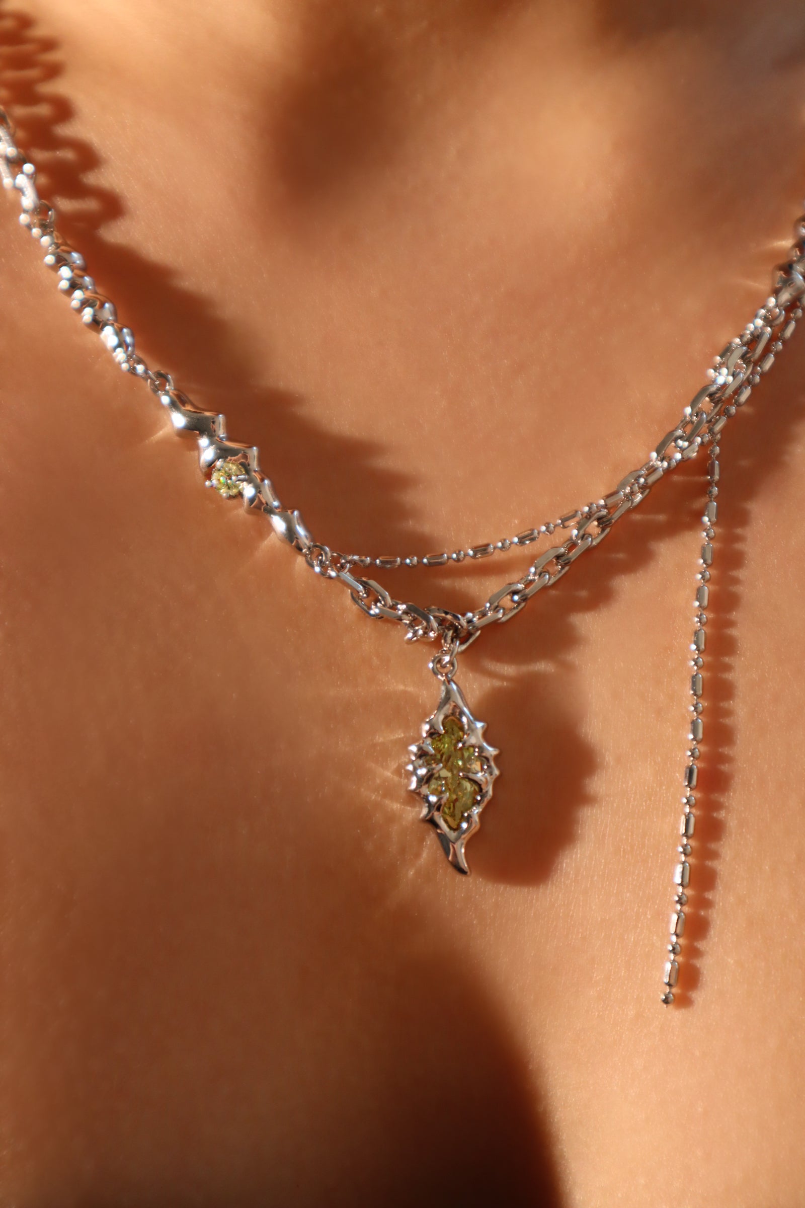 Platinum Plated Green Gem Feather Necklace