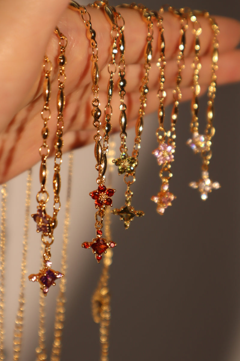 18K gold-plated cross necklace set with pink zirconia gemstones