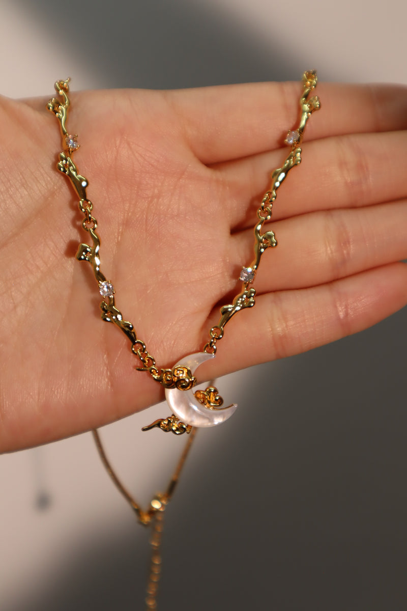 18K gold-plated crescent moon necklace with natural white shell pendant and zirconia diamonds