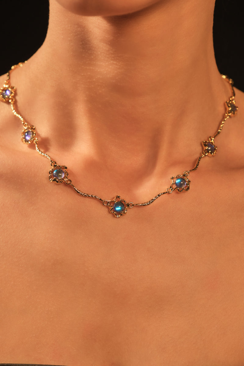 18K gold-plated necklace with multiple deep blue zirconia moonstones on a delicate chain