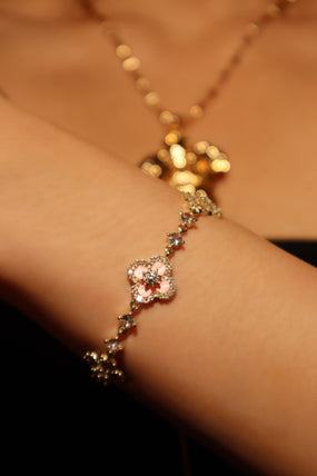 14K gold-plated lucky leaf bracelet with zirconia diamonds and pink resin accents