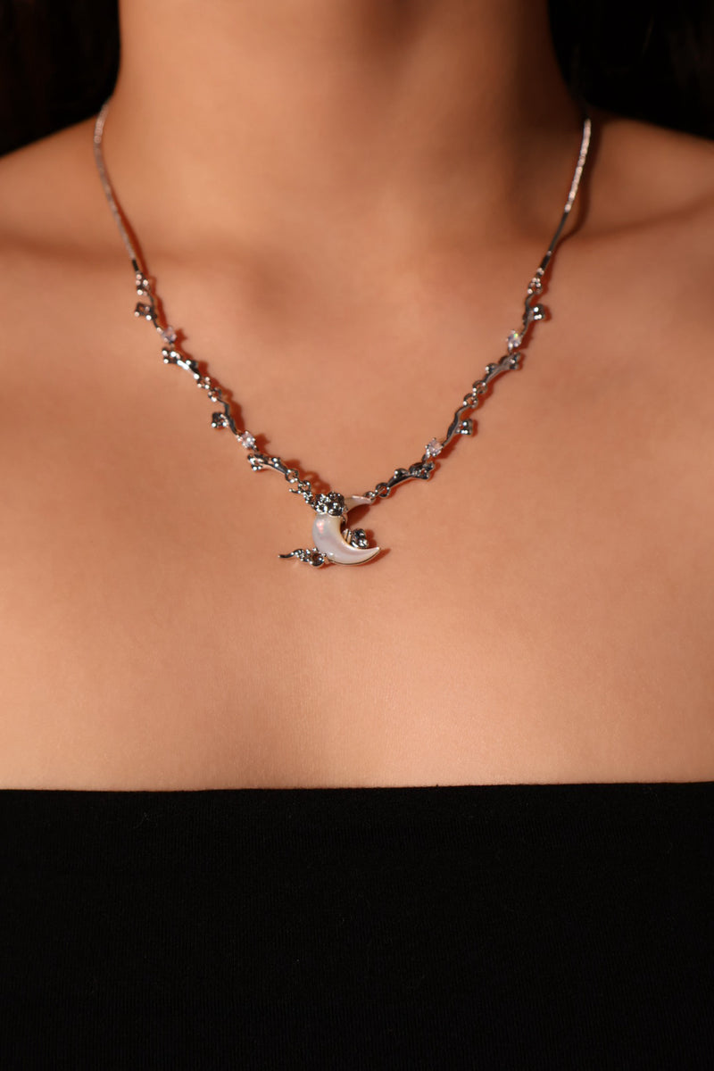 Palladium white gold plated crescent moon necklace with natural white shell pendant and zirconia diamonds