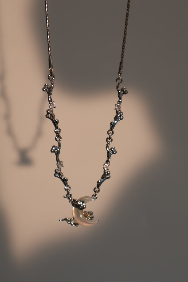 Palladium white gold plated crescent moon necklace with natural white shell pendant and zirconia diamonds