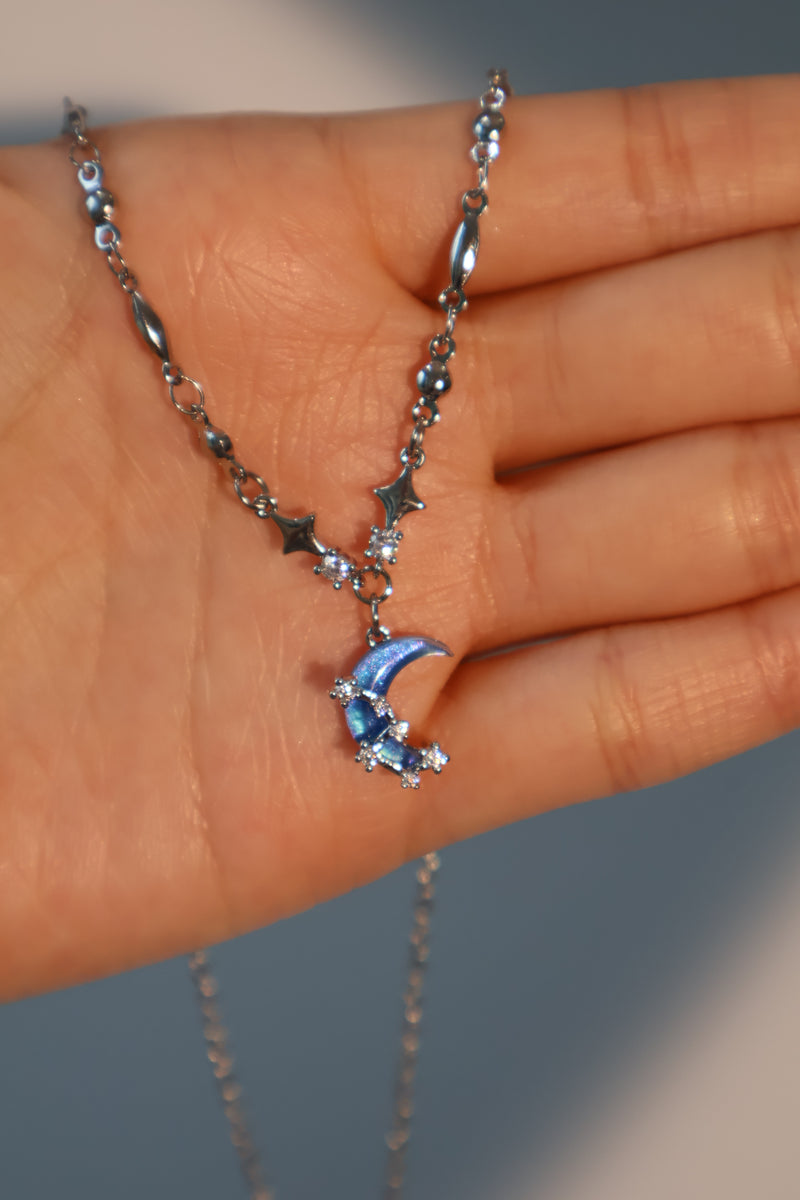Palladium white-gold-plated moon and star necklace with a zirconia moonstone and zirconia diamonds