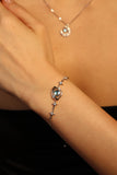 Platinum Plated Moonstone Saturn Star Bracelet