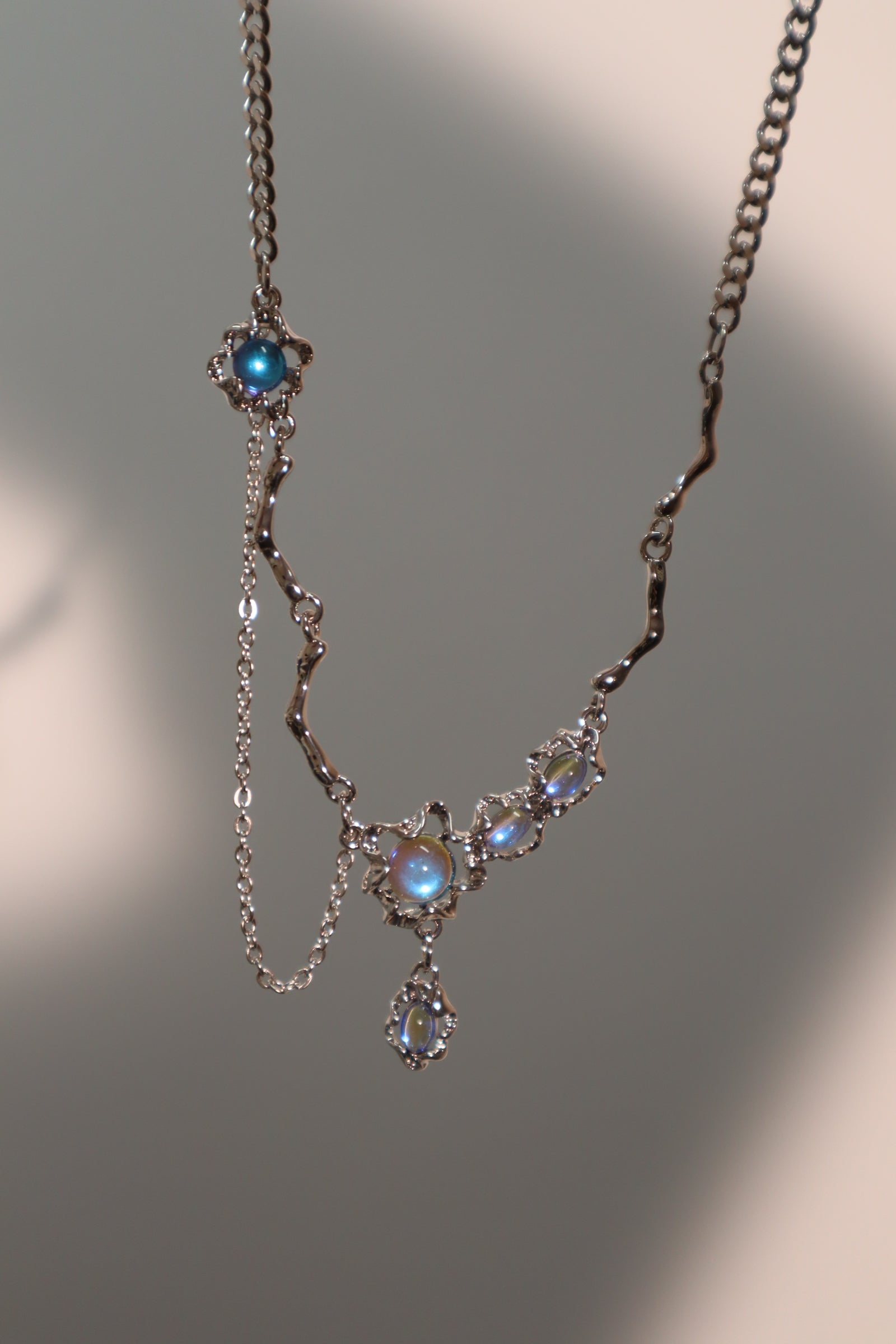 Platinum Plated Deep Blue Moonstone Dangle Necklace
