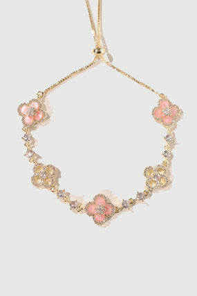 14K gold-plated lucky leaf bracelet with zirconia diamonds and pink resin accents