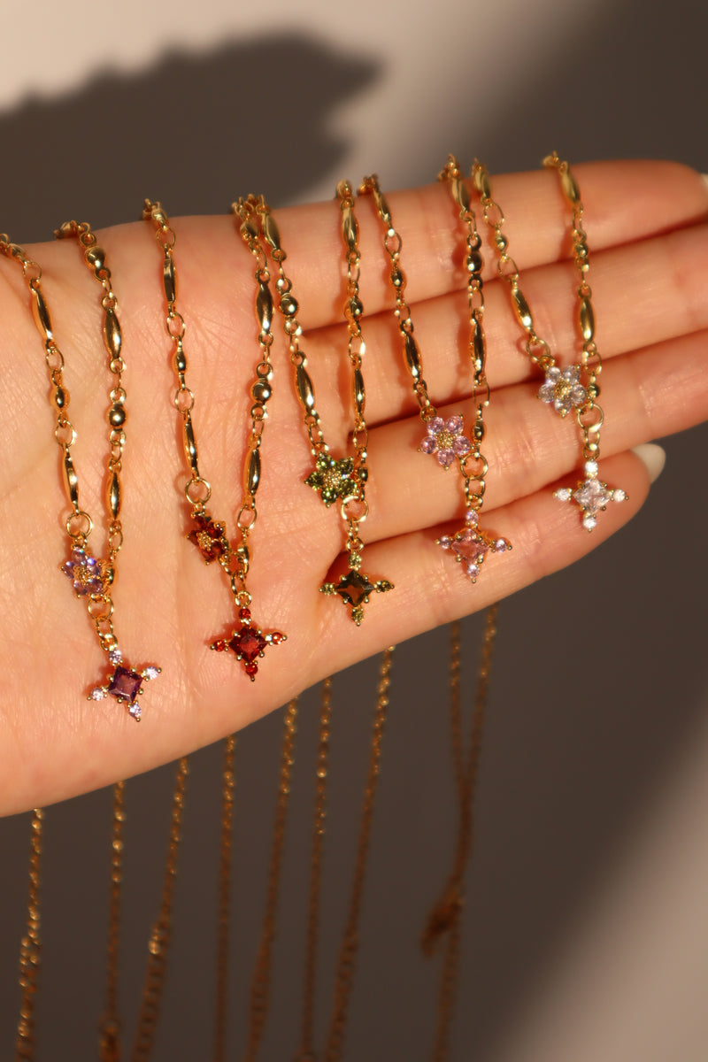 18K gold-plated cross necklace set with pink zirconia gemstones