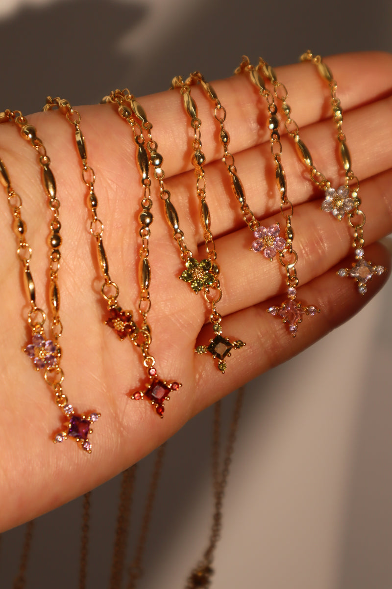 18K gold-plated cross necklace set with pink zirconia gemstones