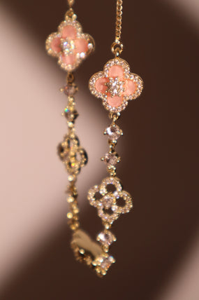 14K gold-plated lucky leaf bracelet with zirconia diamonds and pink resin accents