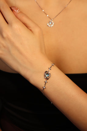 Platinum Plated Moonstone Saturn Star Bracelet