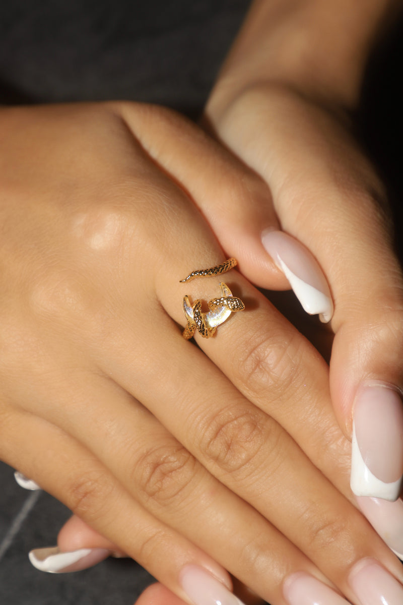 20K gold-plated adjustable snake wrap ring with a moonstone moon