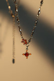 Platinum Plated Garnet Diamond Cross Necklace