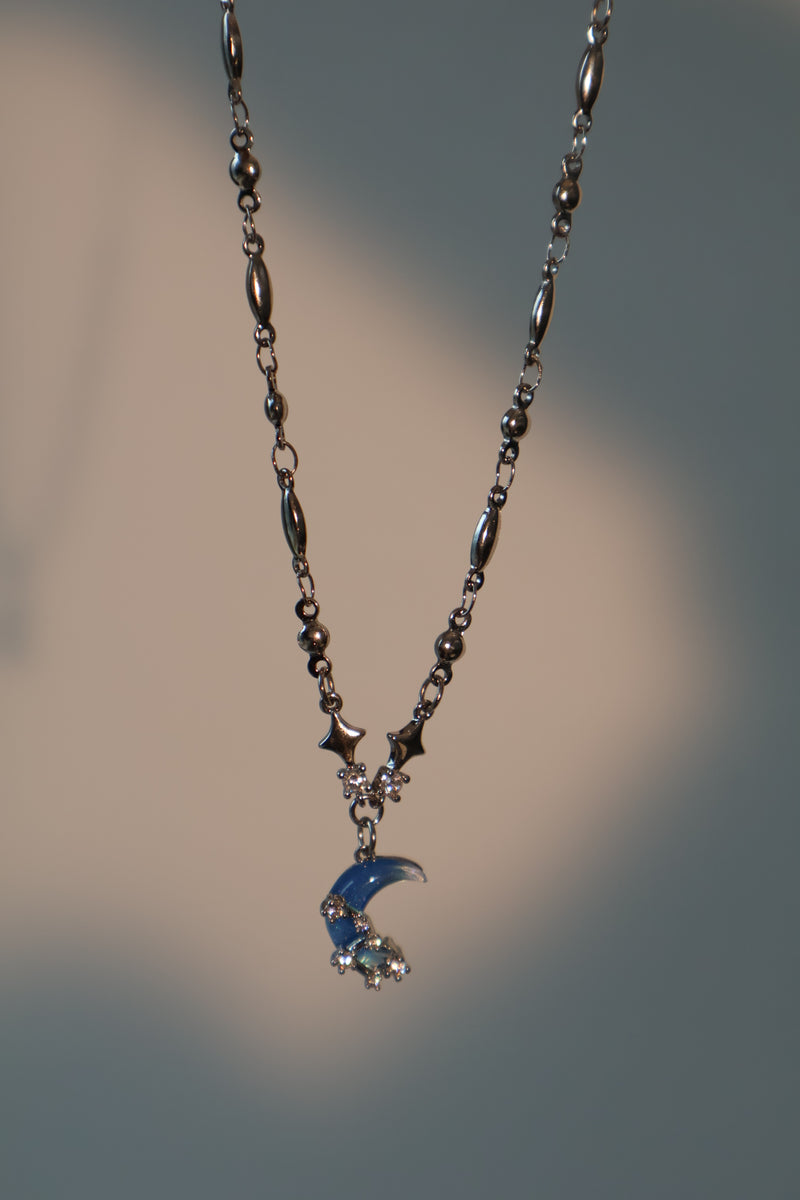 Palladium white-gold-plated moon and star necklace with a zirconia moonstone and zirconia diamonds