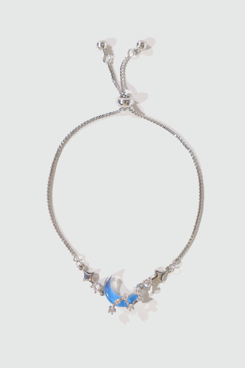 Palladium white gold plated chain bracelet with moonstone, crescent moon and star charms