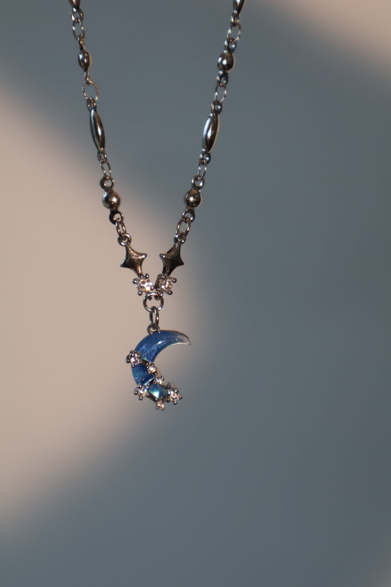 Palladium white-gold-plated moon and star necklace with a zirconia moonstone and zirconia diamonds
