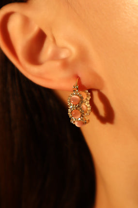 Gold-plated pink opal hoop earrings with pink zirconia gemstones and sparkling accents