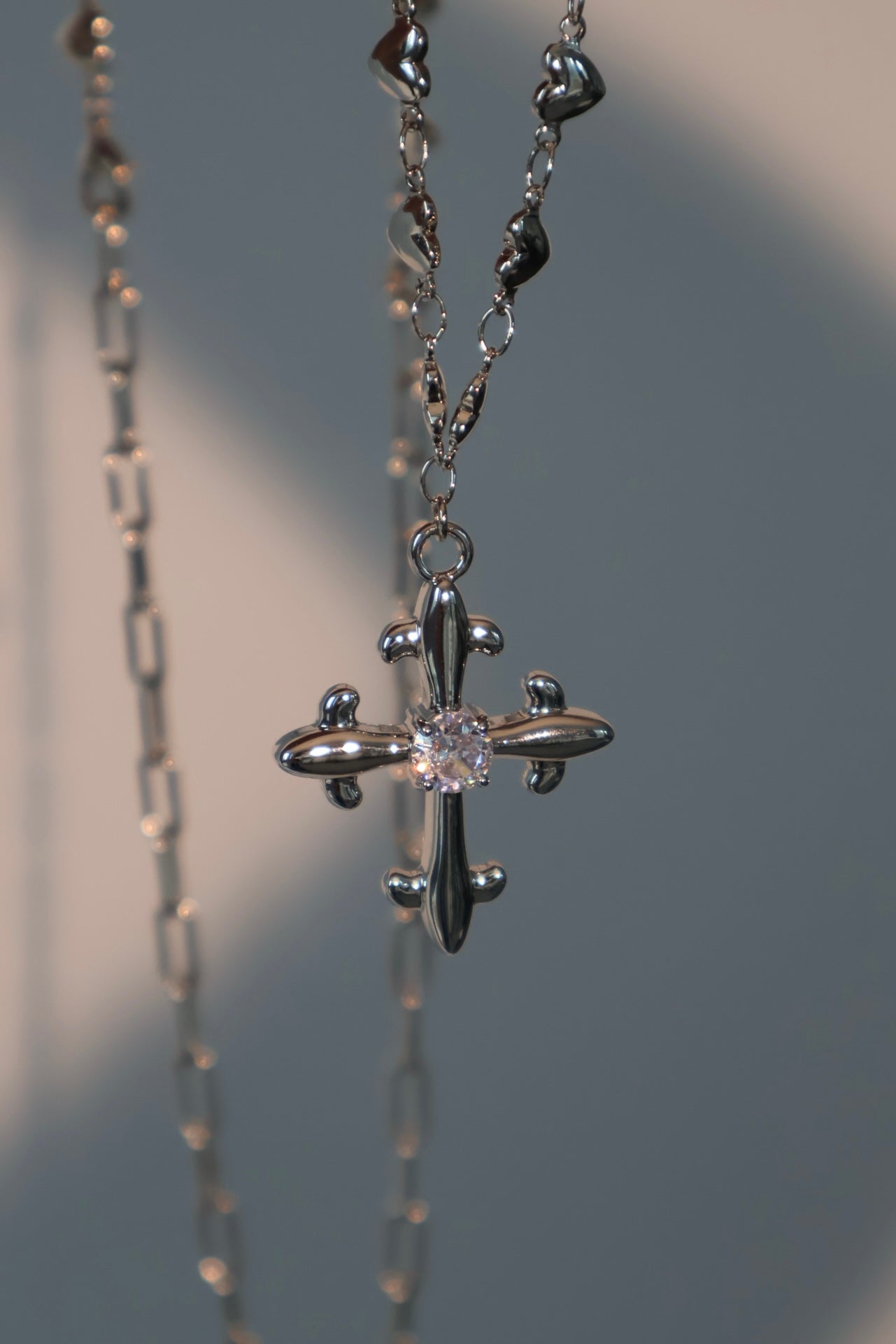 Platinum Plated Diamond Cross of Hearts Necklace