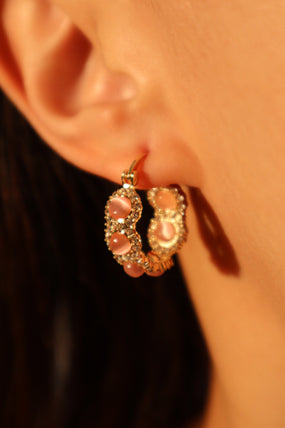 Gold-plated pink opal hoop earrings with pink zirconia gemstones and sparkling accents