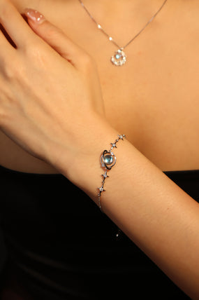 Platinum Plated Moonstone Saturn Star Bracelet