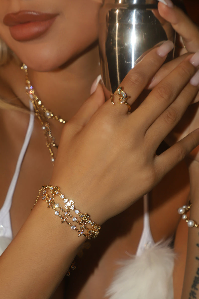 20K gold-plated adjustable snake wrap ring with a moonstone moon