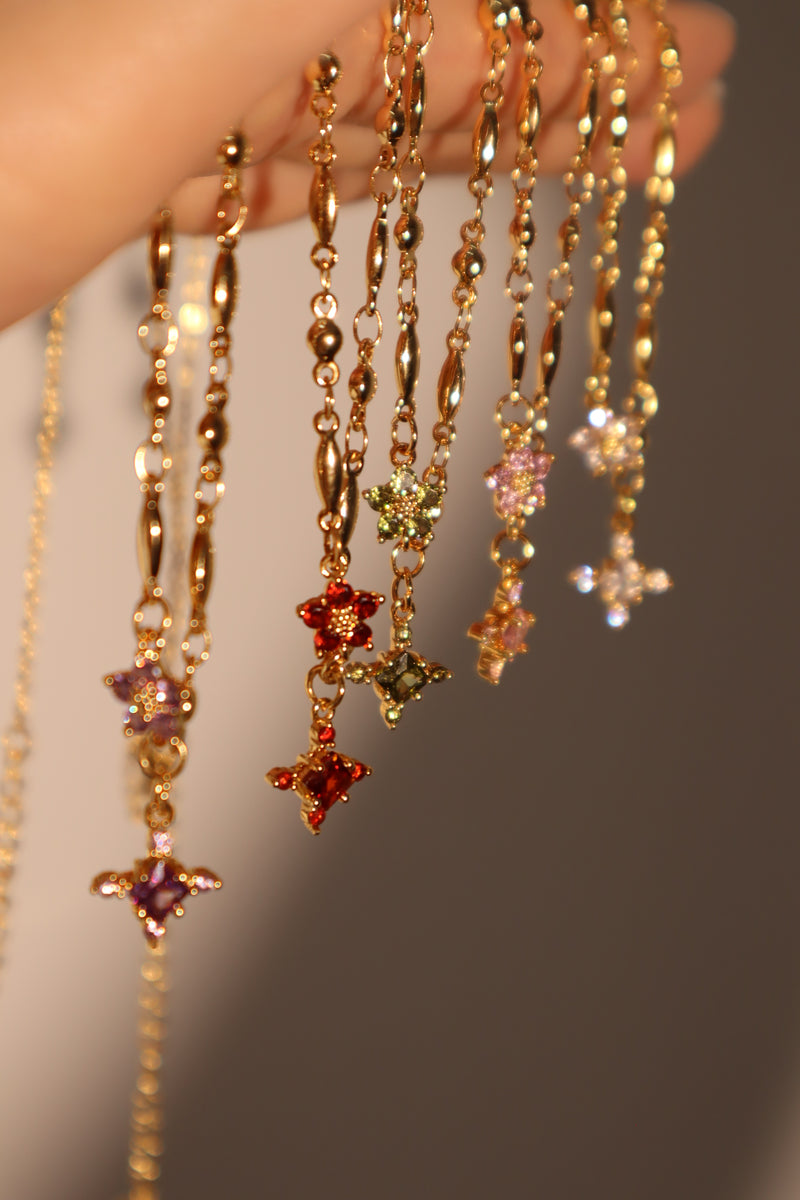 18K gold-plated cross necklace set with pink zirconia gemstones