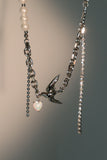 Platinum Plated White Opal Pigeon Necklace