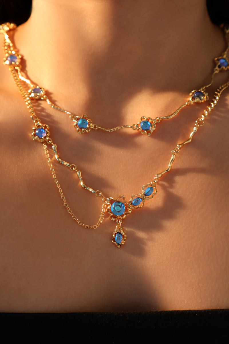 18K gold-plated dangle necklace with deep blue zirconia moonstones