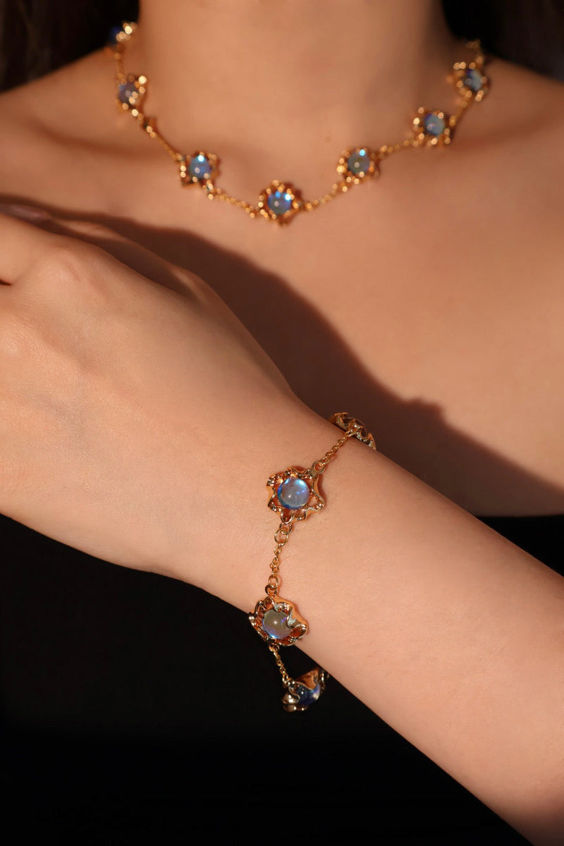18K gold-plated necklace with multiple deep blue zirconia moonstones on a delicate chain