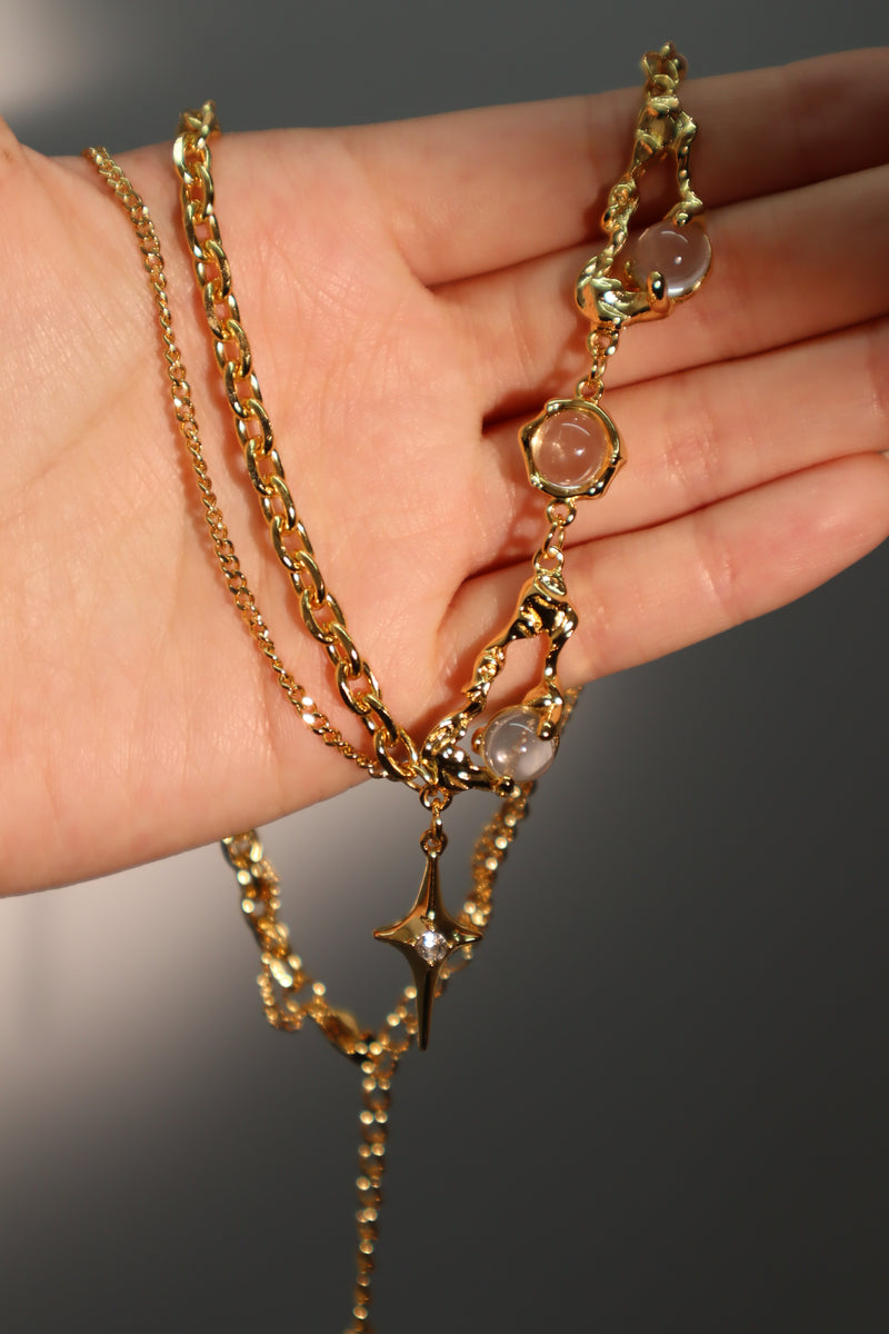 18K gold-plated moonlight star necklace with glowing zirconia moon gems