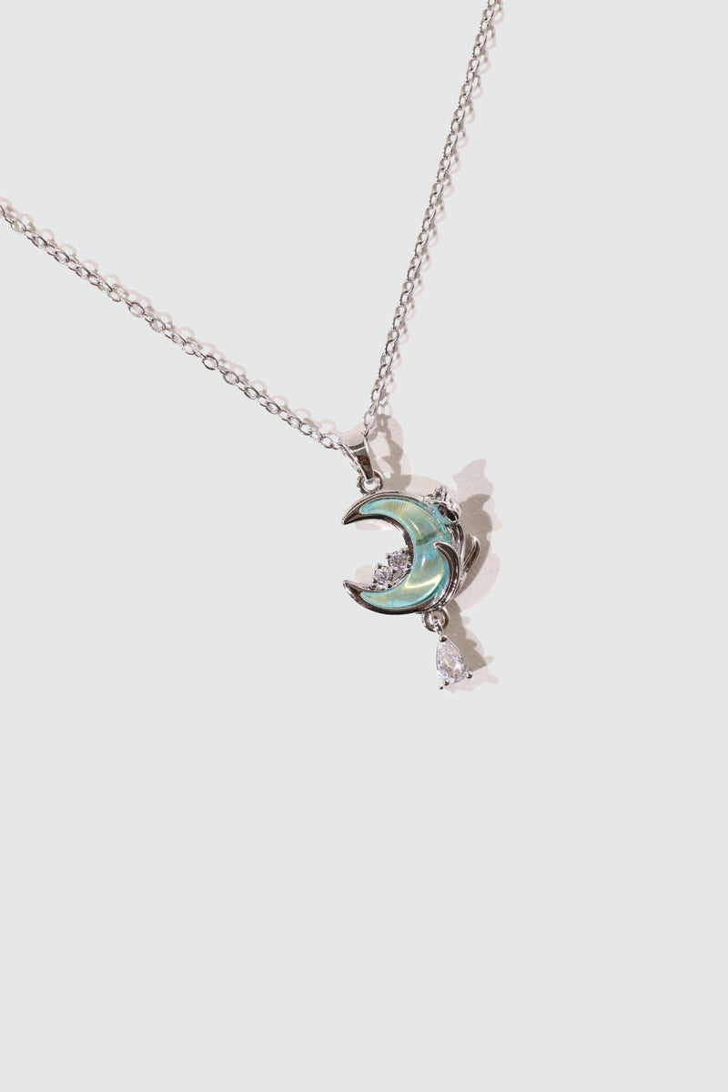 Rose and moon necklace with a blue zirconia moonstone and cut zirconia on a stainless steel chain