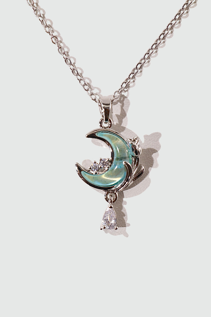 Rose and moon necklace with a blue zirconia moonstone and cut zirconia on a stainless steel chain