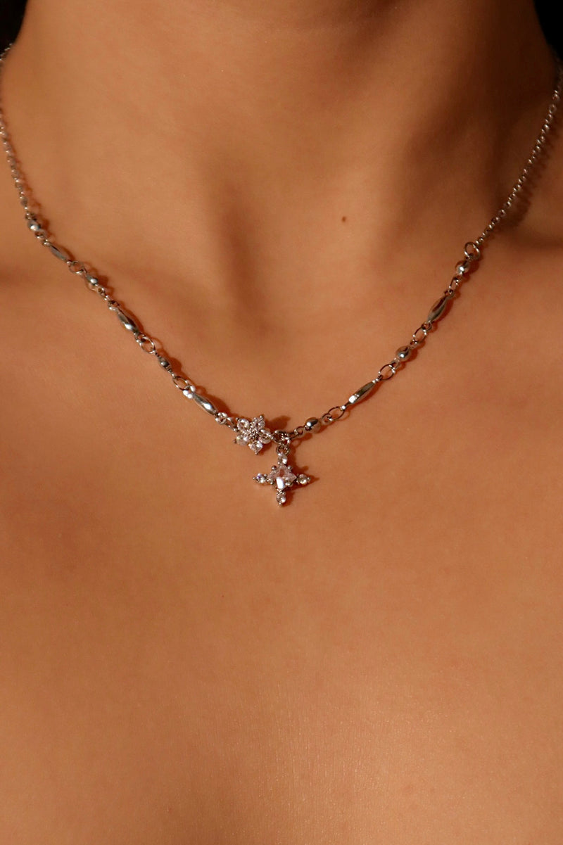 Palladium white gold plated starlight bloom and cross necklaces with zirconia for layering