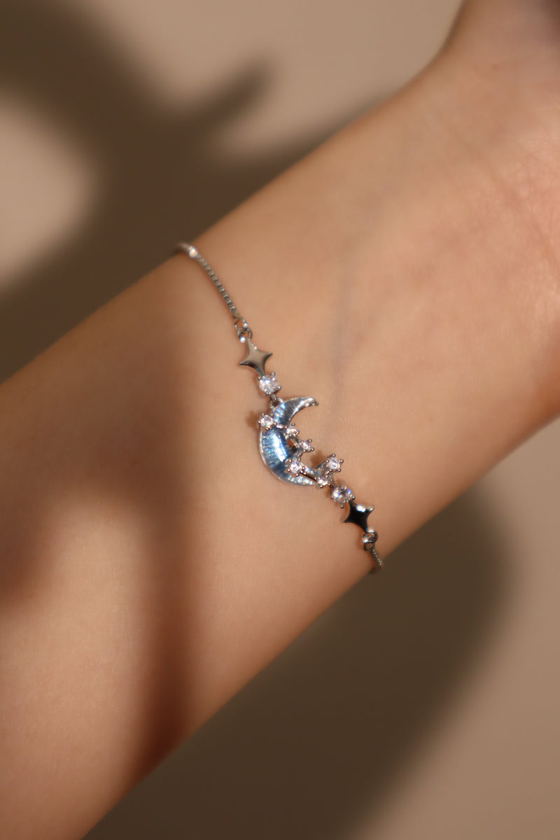 Palladium white gold plated chain bracelet with moonstone, crescent moon and star charms