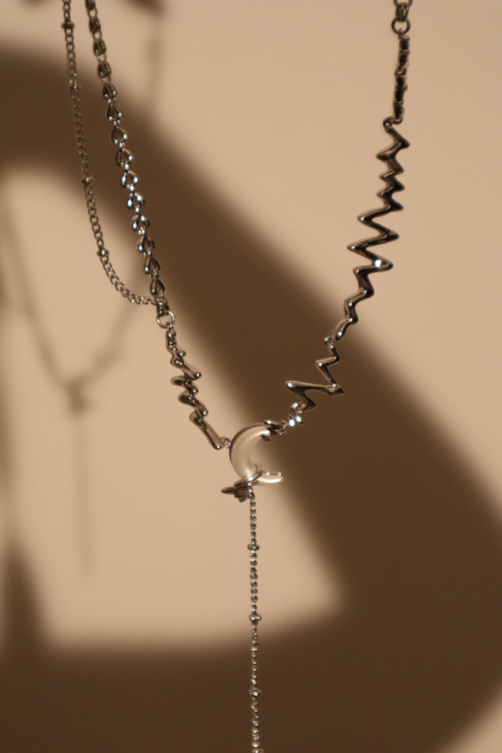 Platinum Plated Moon Thunder Necklace