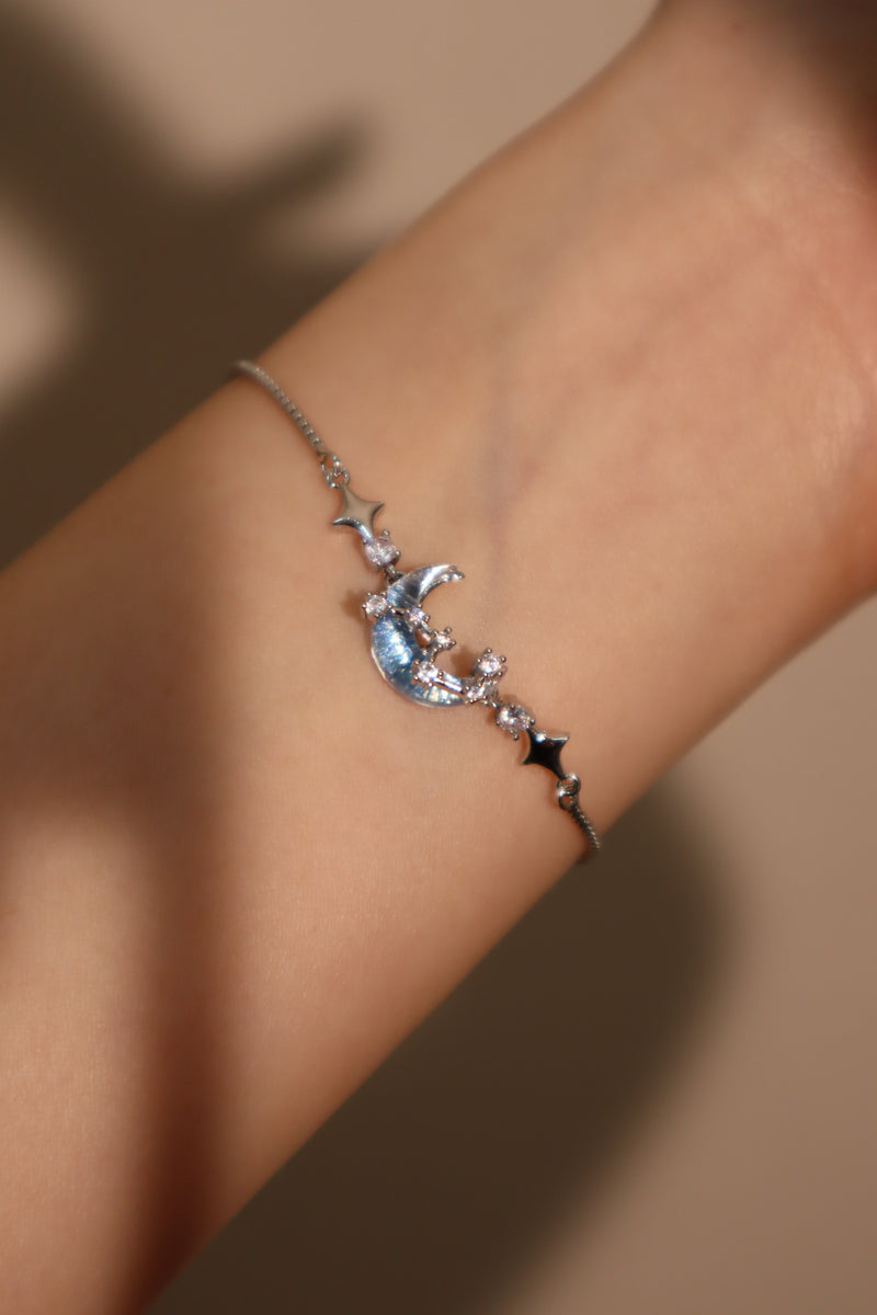 Palladium white gold plated chain bracelet with moonstone, crescent moon and star charms