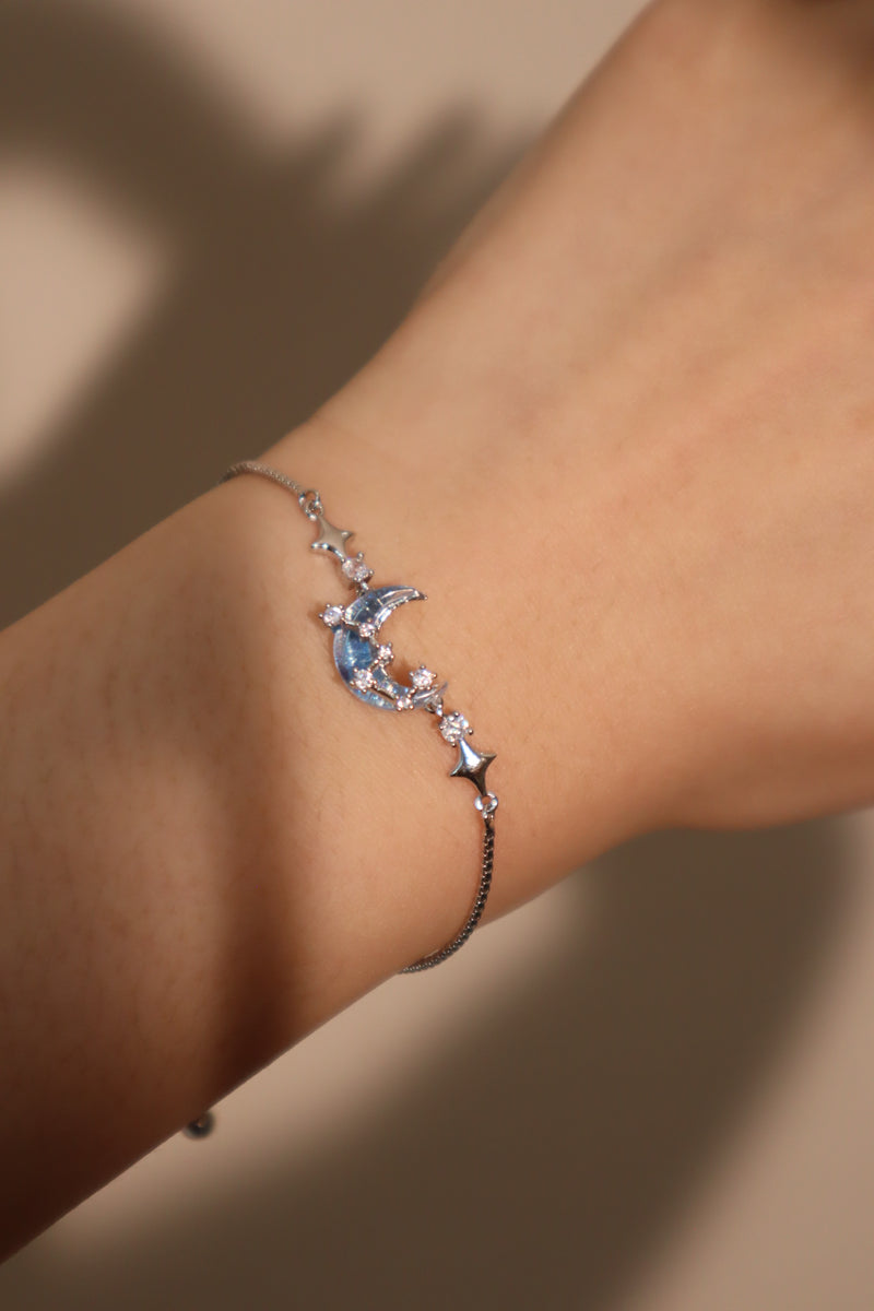 Palladium white gold plated chain bracelet with moonstone, crescent moon and star charms