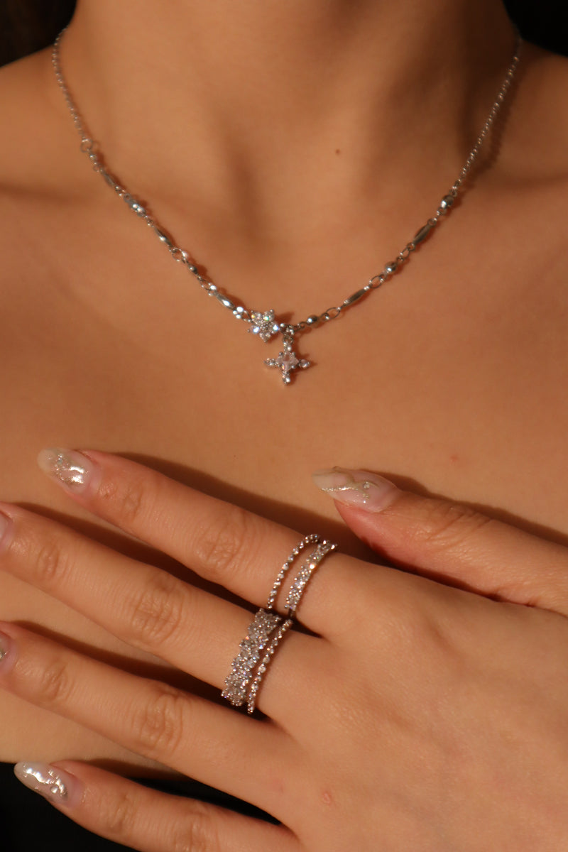 Palladium white gold plated cross necklace on a stainless steel chain with zirconia diamonds