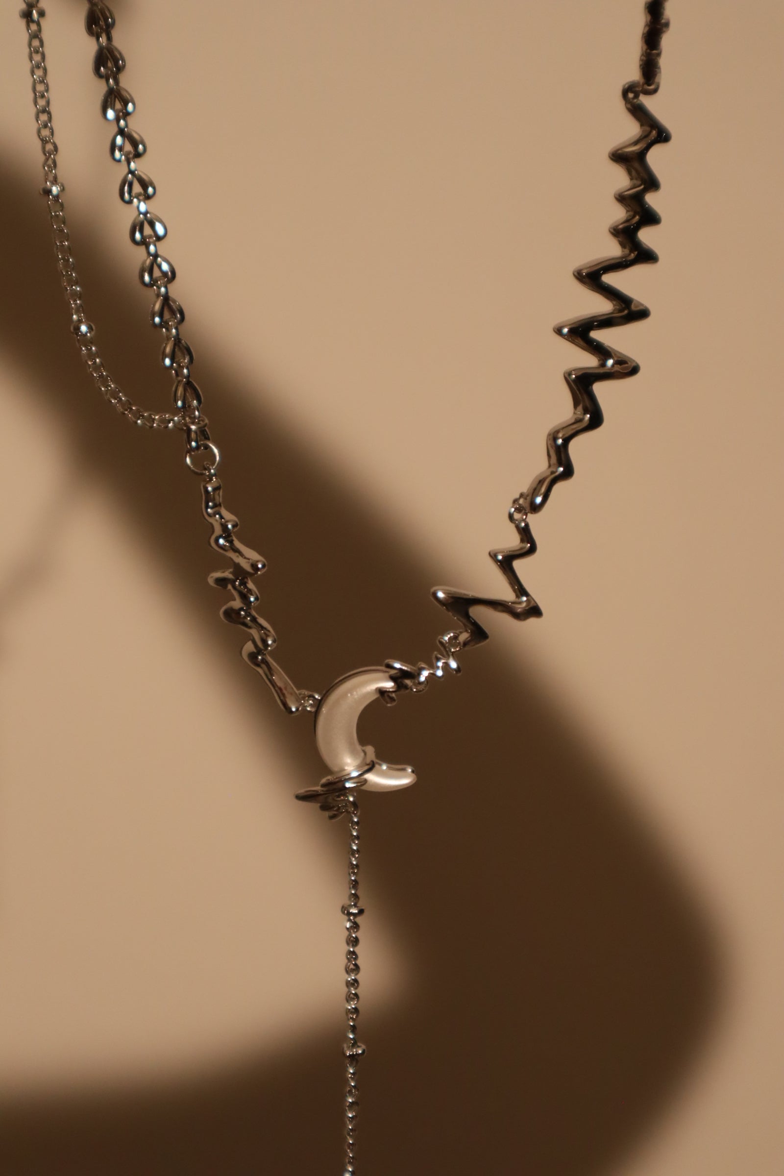 Platinum Plated Moon Thunder Necklace