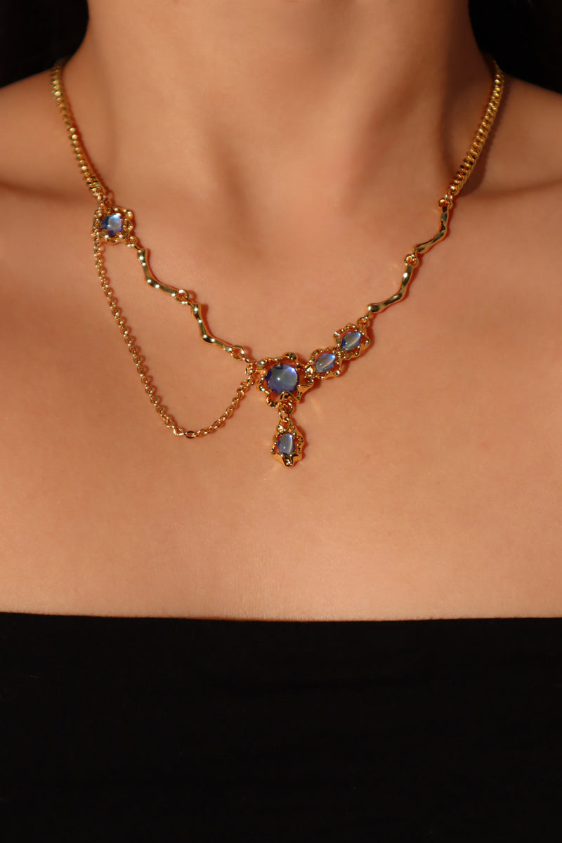 18K gold-plated dangle necklace with deep blue zirconia moonstones