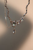 Platinum Plated Moonstone Dangle Necklace