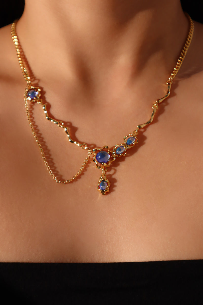 18K gold-plated dangle necklace with deep blue zirconia moonstones