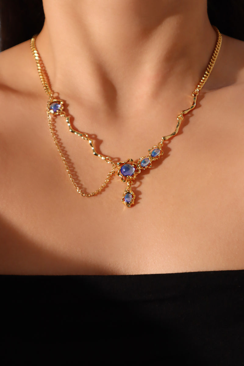 18K gold-plated dangle necklace with deep blue zirconia moonstones