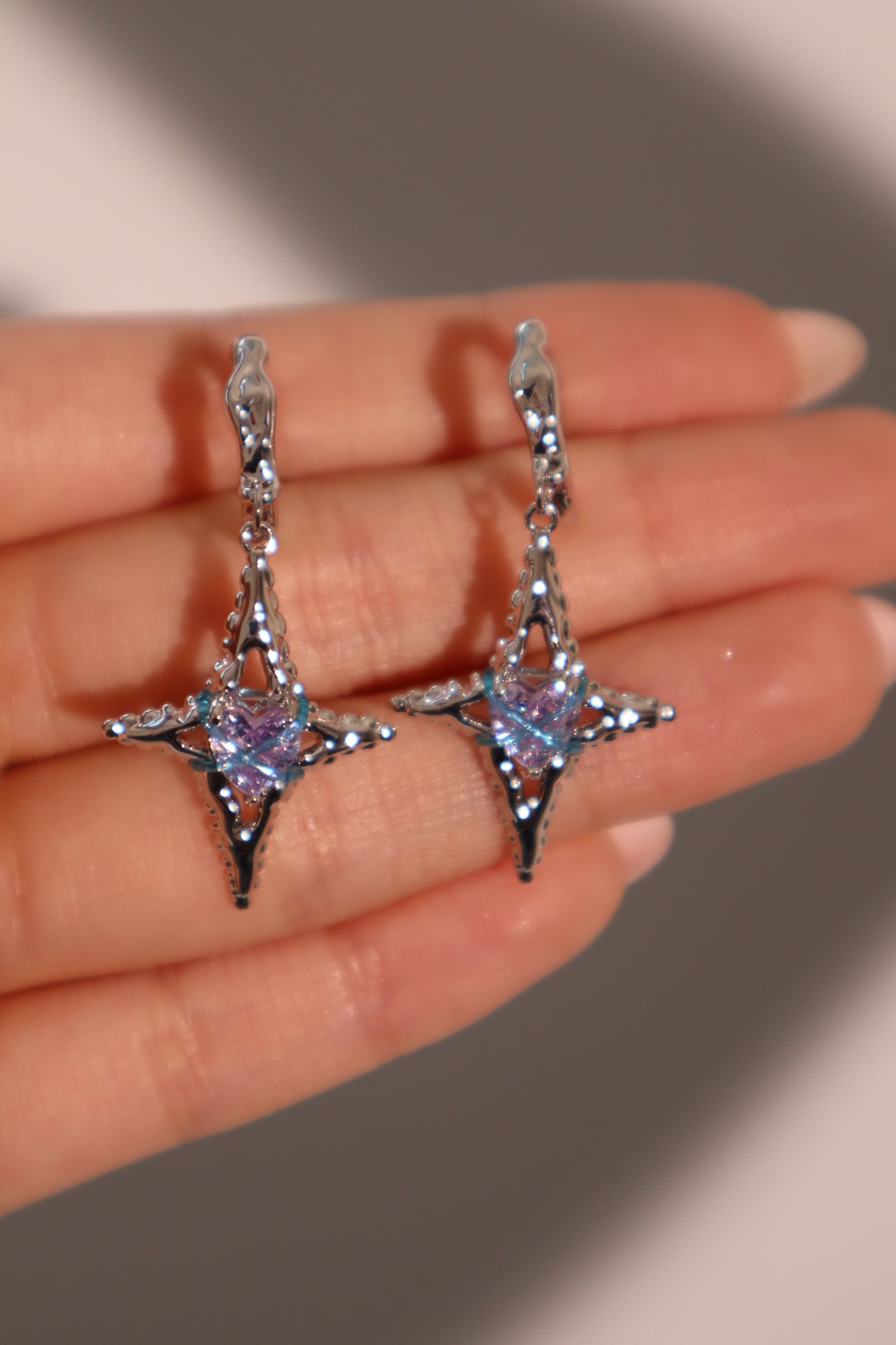 Platinum Plated Blue Cross Purple Gem Star Earrings