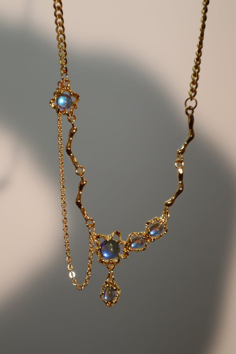 18K gold-plated dangle necklace with deep blue zirconia moonstones