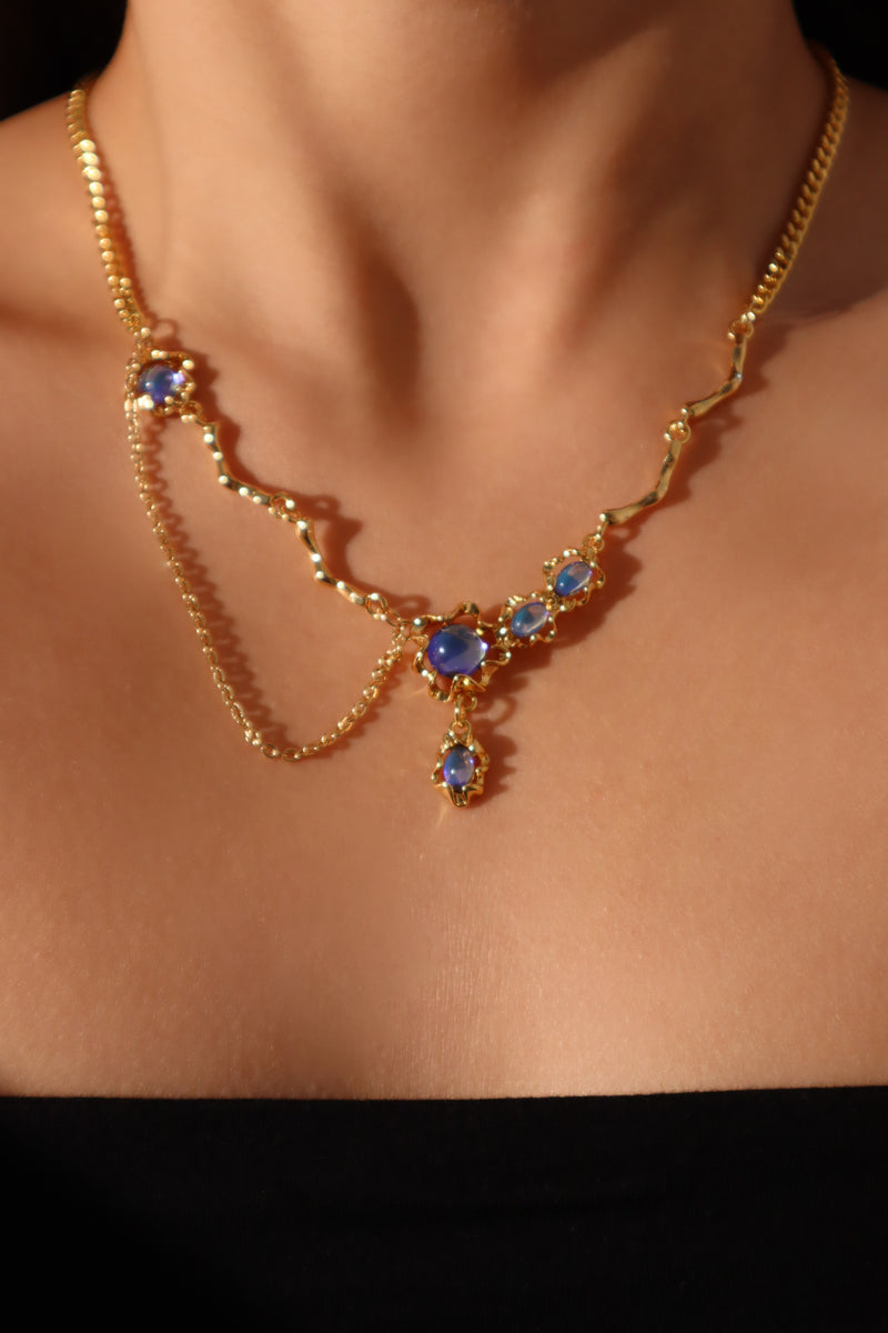 18K gold-plated dangle necklace with deep blue zirconia moonstones