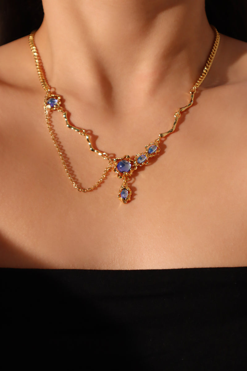 18K gold-plated dangle necklace with deep blue zirconia moonstones