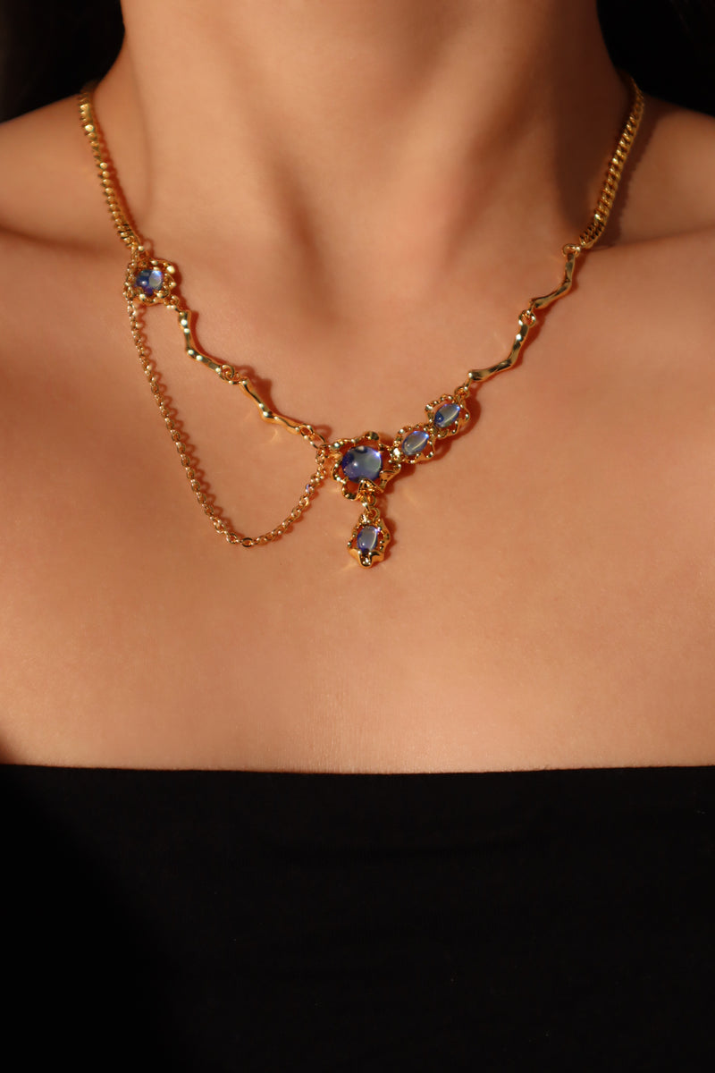 18K gold-plated dangle necklace with deep blue zirconia moonstones